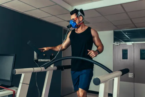 Athlete testing his performance in sports science lab