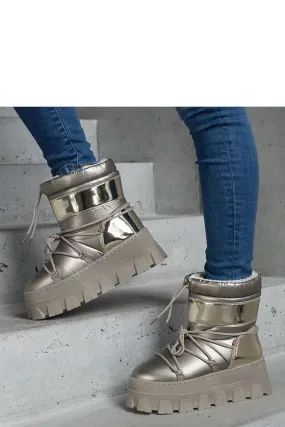 Golden snow boots on a platform